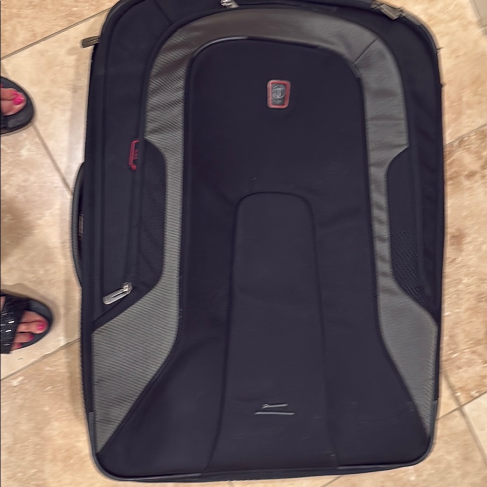Tumi Black and Gray Luggage